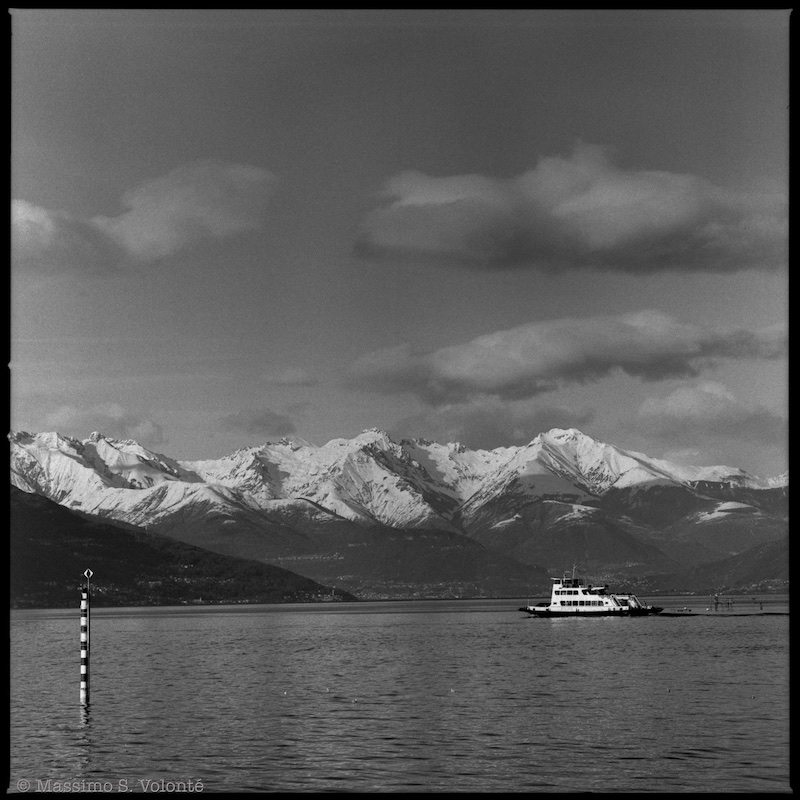A vessel sailing the lake, black and white photography